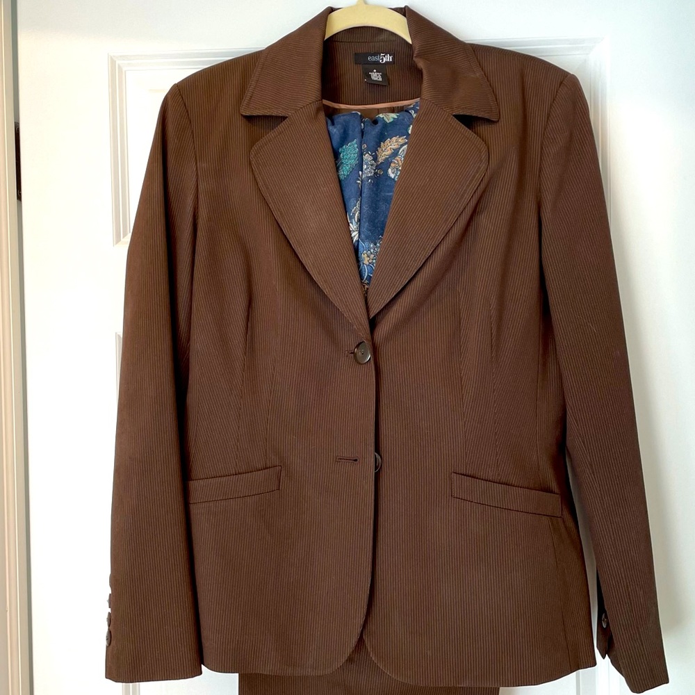 Brown pinstripe pantsuit.